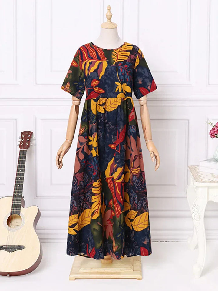 Calista | Bold Botanical Print Flowing Midi Dress